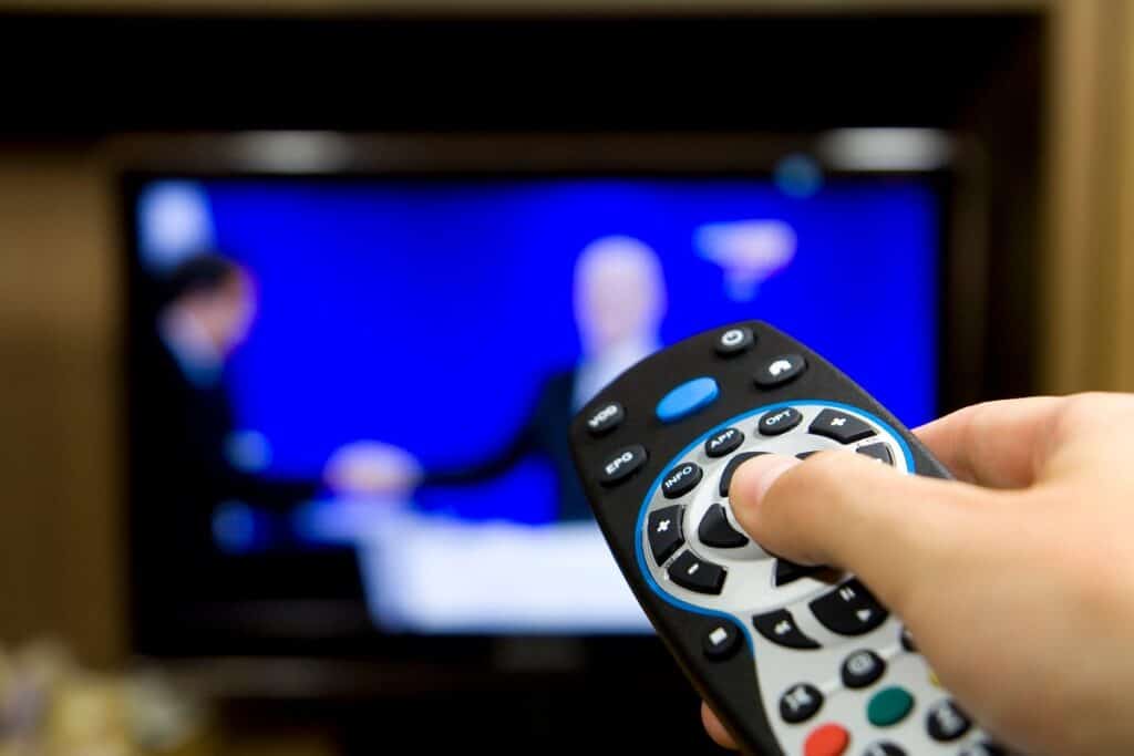 TV remote pointed at screen for ITV soaps schedule 27th April to 1st May 2026 and spoilers.