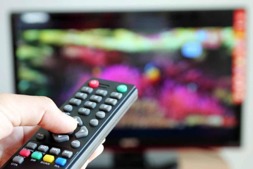 TV remote pointed at screen for ITV soaps schedule 3rd to 7th August 2026 and spoilers.